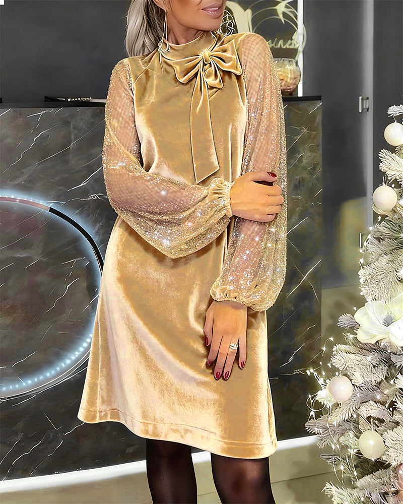 Elegante vestido con mangas abullonadas y patchwork-ES