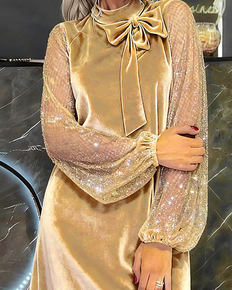 Elegante vestido con mangas abullonadas y patchwork-ES