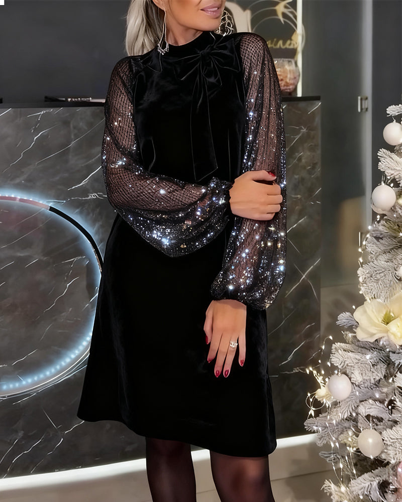 Elegante vestido con mangas abullonadas y patchwork-ES