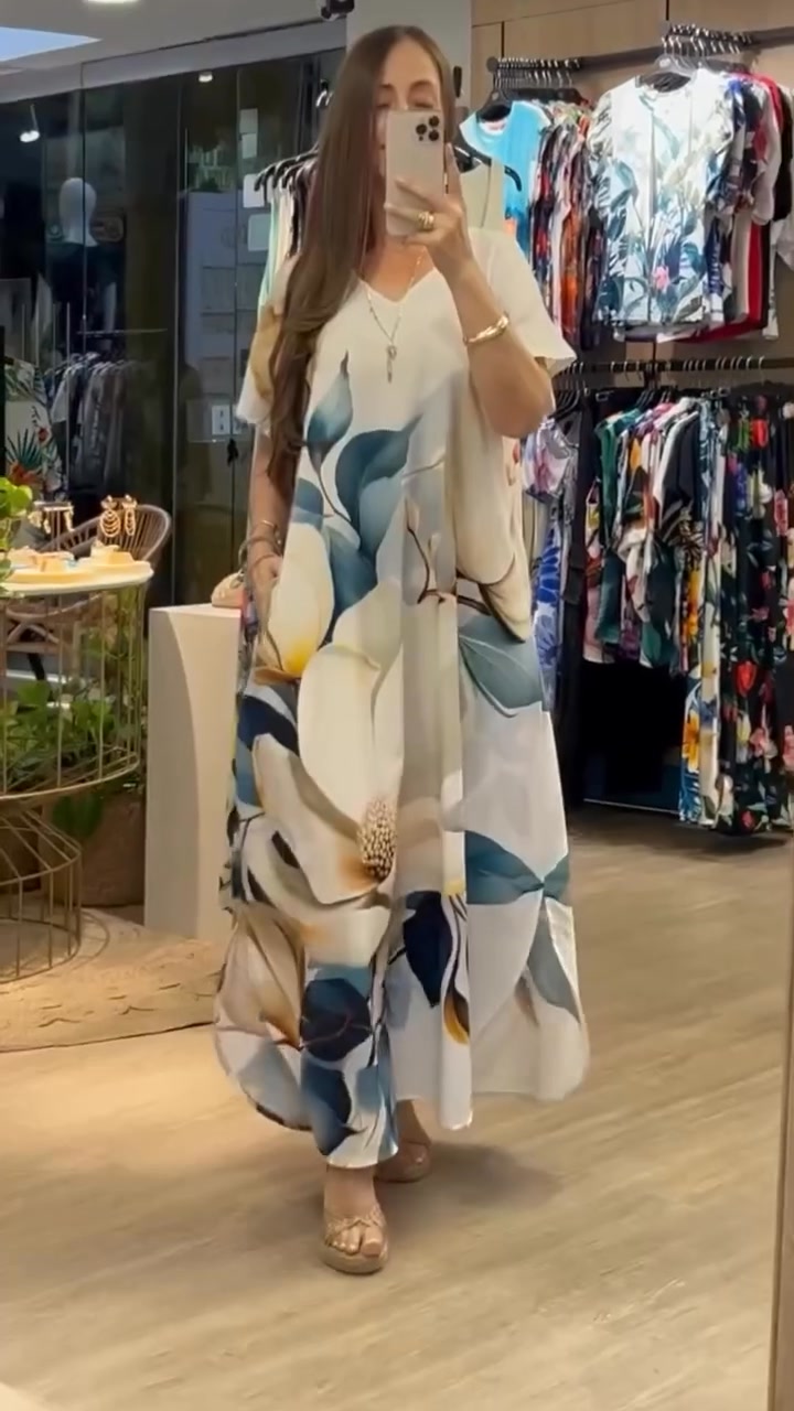 Vestido holgado e informal de mujer con escote en V, estampado y mangas cortas.-ES