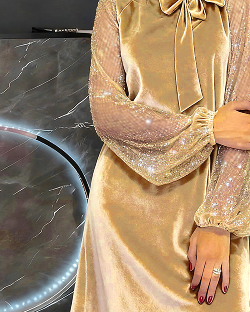 Elegante vestido con mangas abullonadas y patchwork-ES