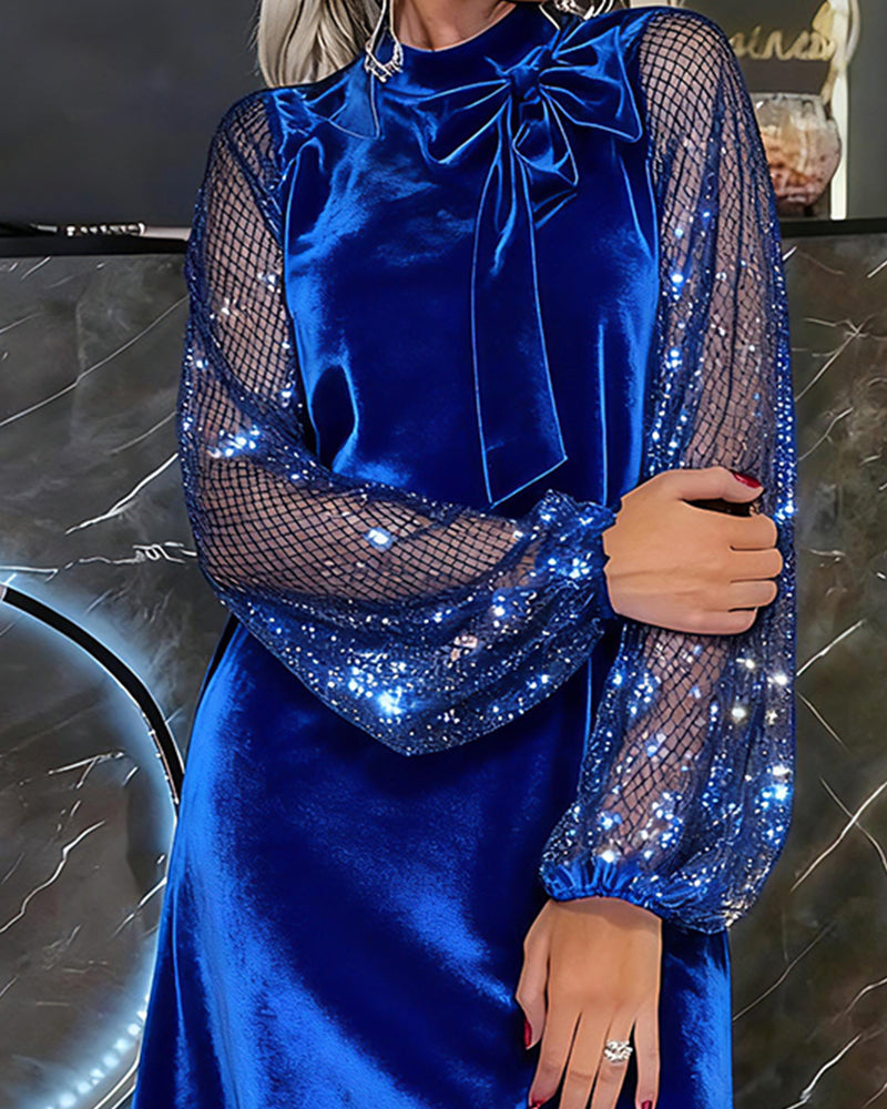 Elegante vestido con mangas abullonadas y patchwork-ES