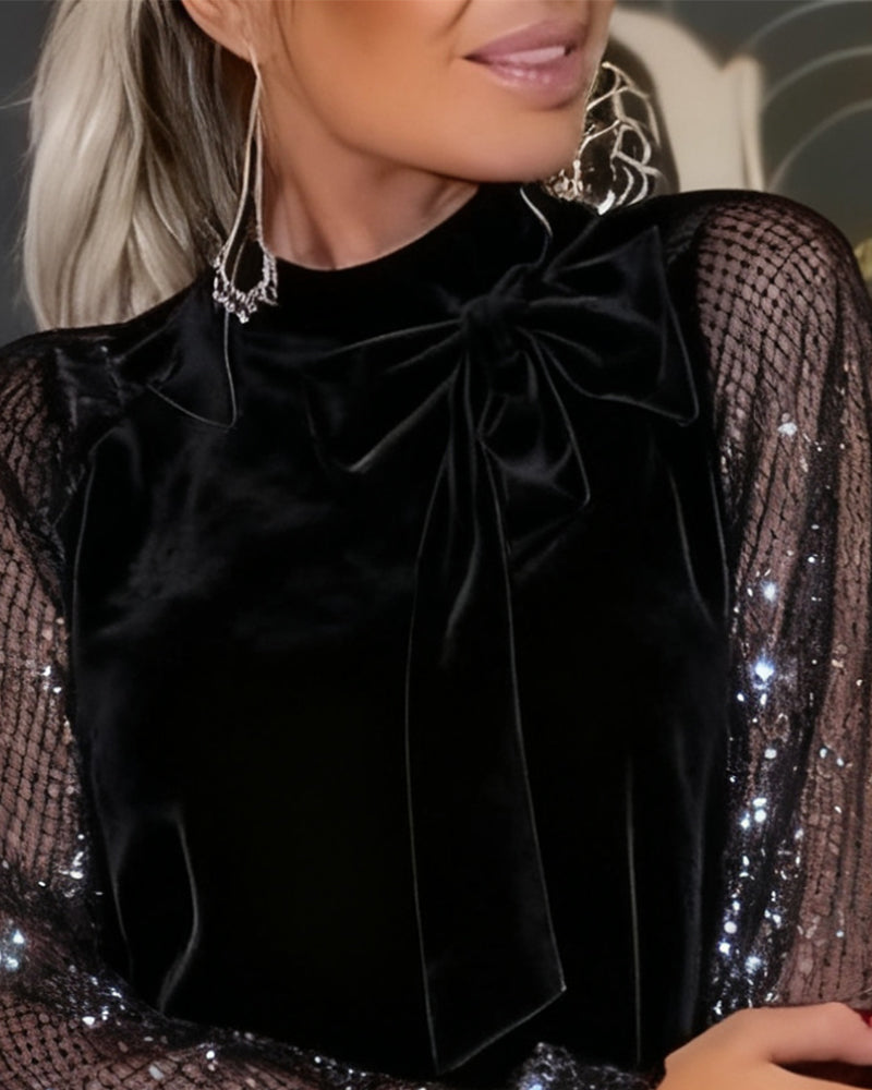 Elegante vestido con mangas abullonadas y patchwork-ES