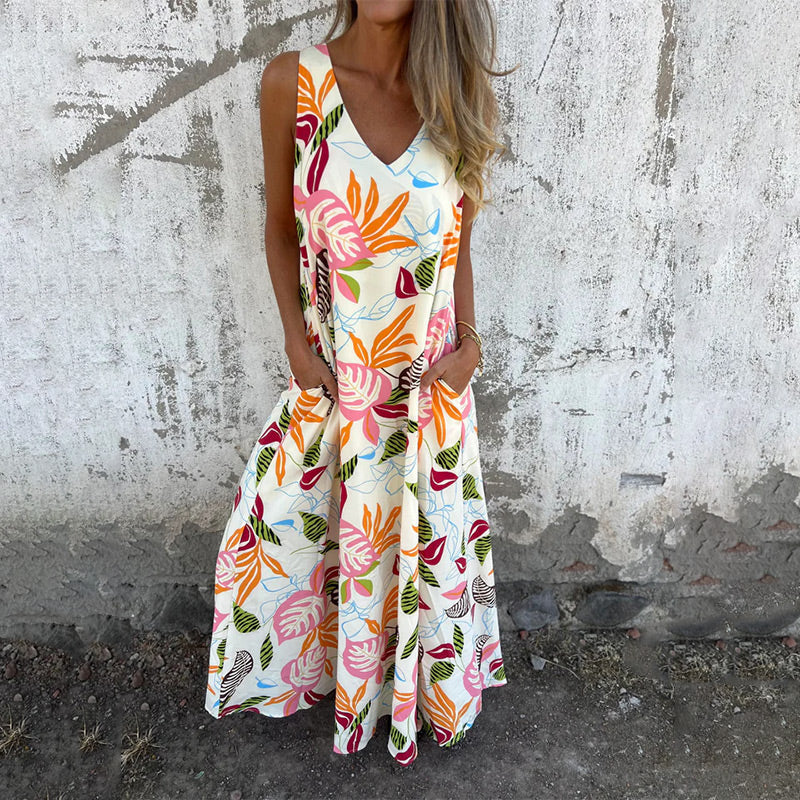 Vestido moderno sin tirantes, escote en V y bolsillos-ES