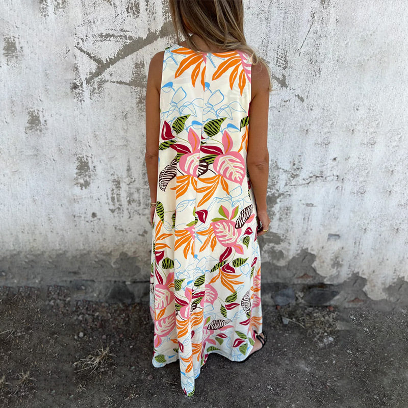 Vestido moderno sin tirantes, escote en V y bolsillos-ES