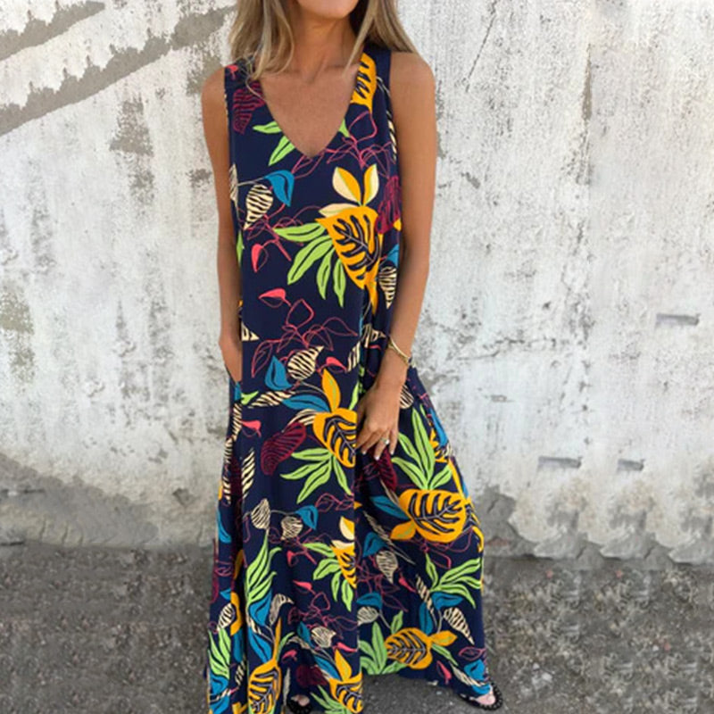 Vestido moderno sin tirantes, escote en V y bolsillos-ES
