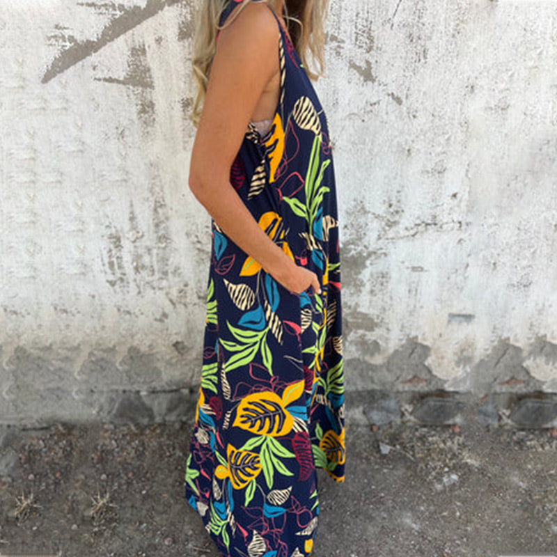 Vestido moderno sin tirantes, escote en V y bolsillos-ES