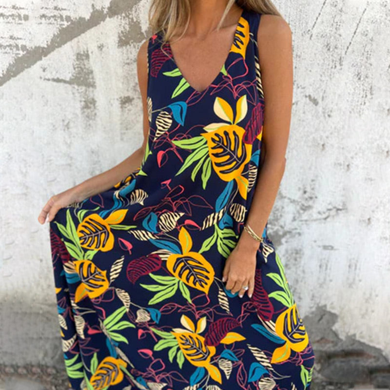 Vestido moderno sin tirantes, escote en V y bolsillos-ES