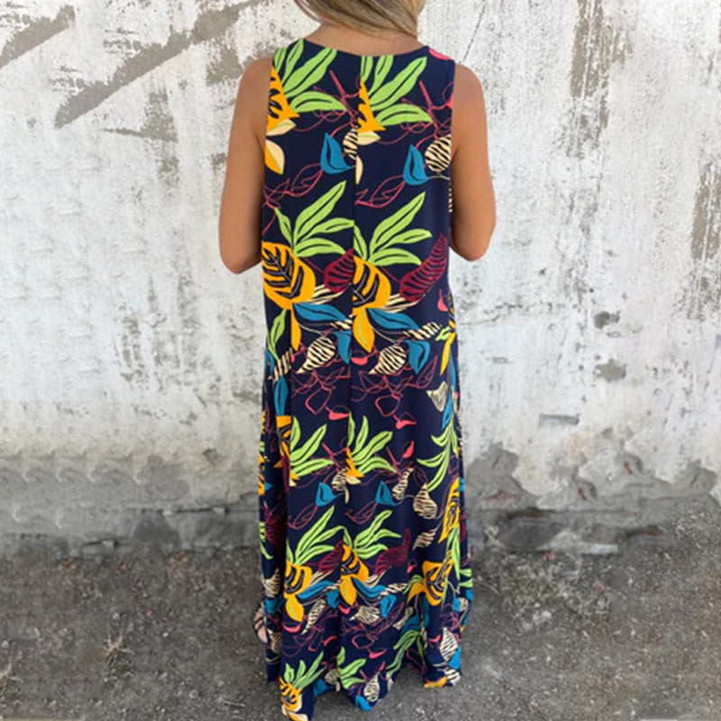 Vestido moderno sin tirantes, escote en V y bolsillos-ES
