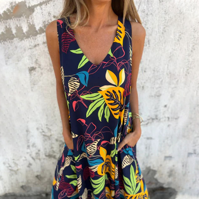 Vestido moderno sin tirantes, escote en V y bolsillos-ES