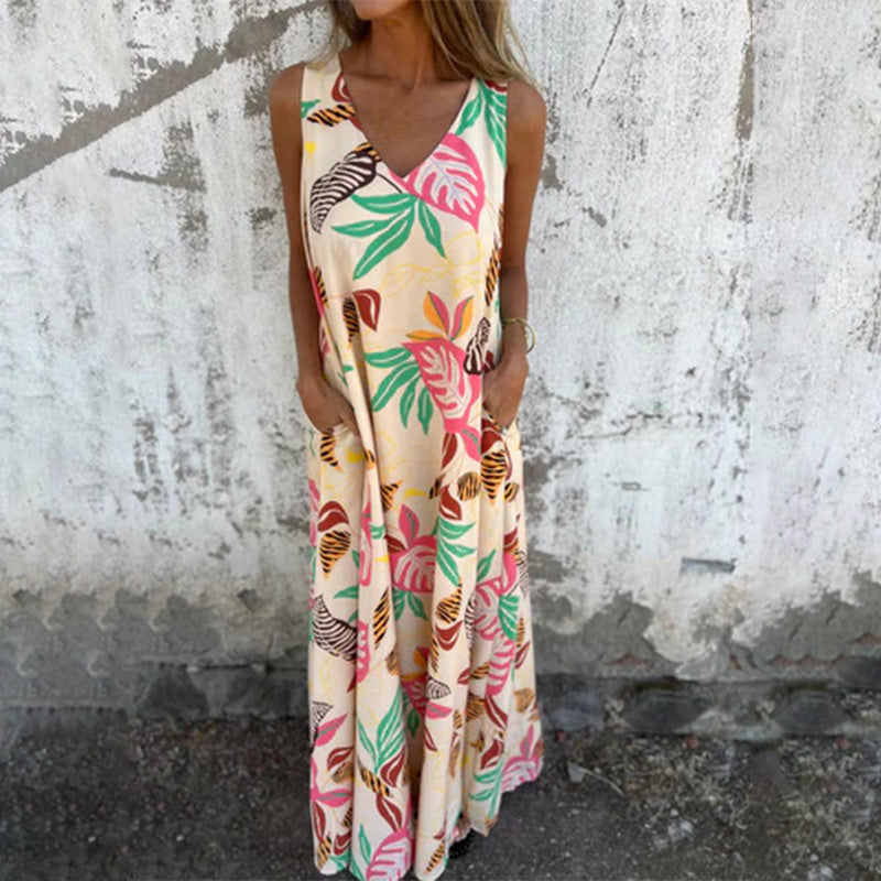 Vestido moderno sin tirantes, escote en V y bolsillos-ES
