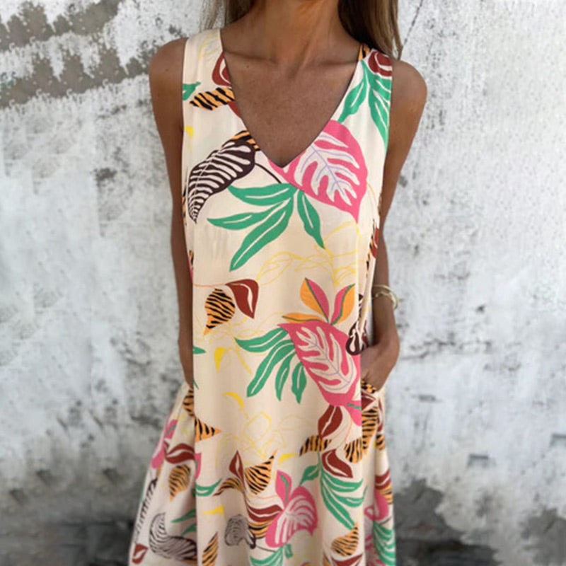 Vestido moderno sin tirantes, escote en V y bolsillos-ES