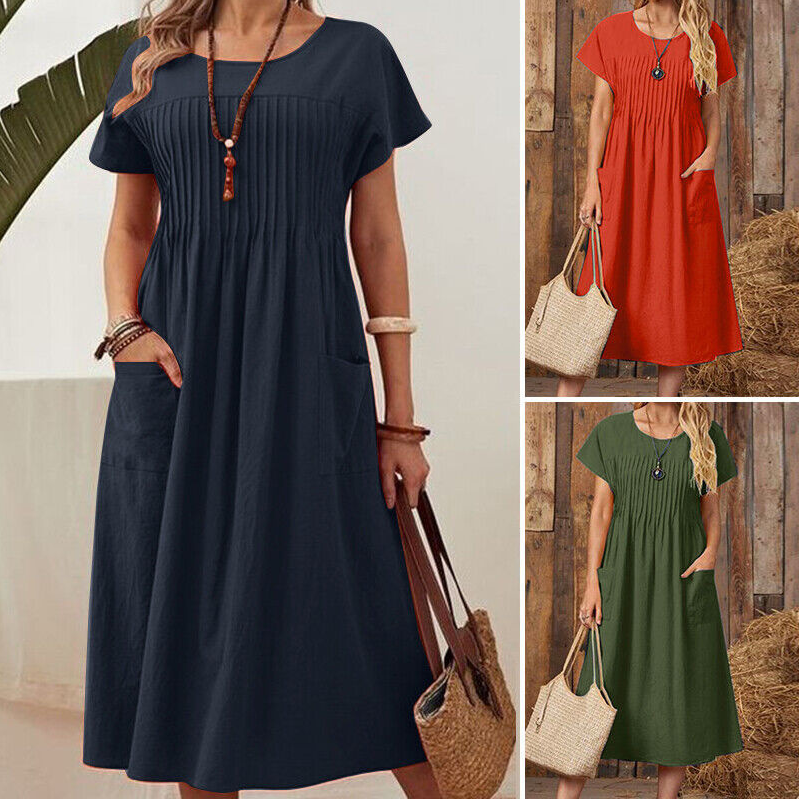 Vestido plisado de mujer con mangas cortas y bolsillos.-ES