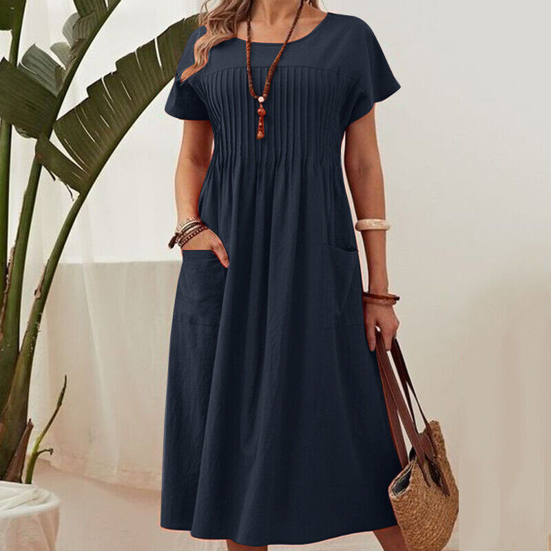 Vestido plisado de mujer con mangas cortas y bolsillos.-ES